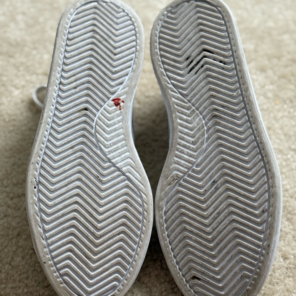 Women’s white adidas, size 8. Worn approximately 5 times, good condition.